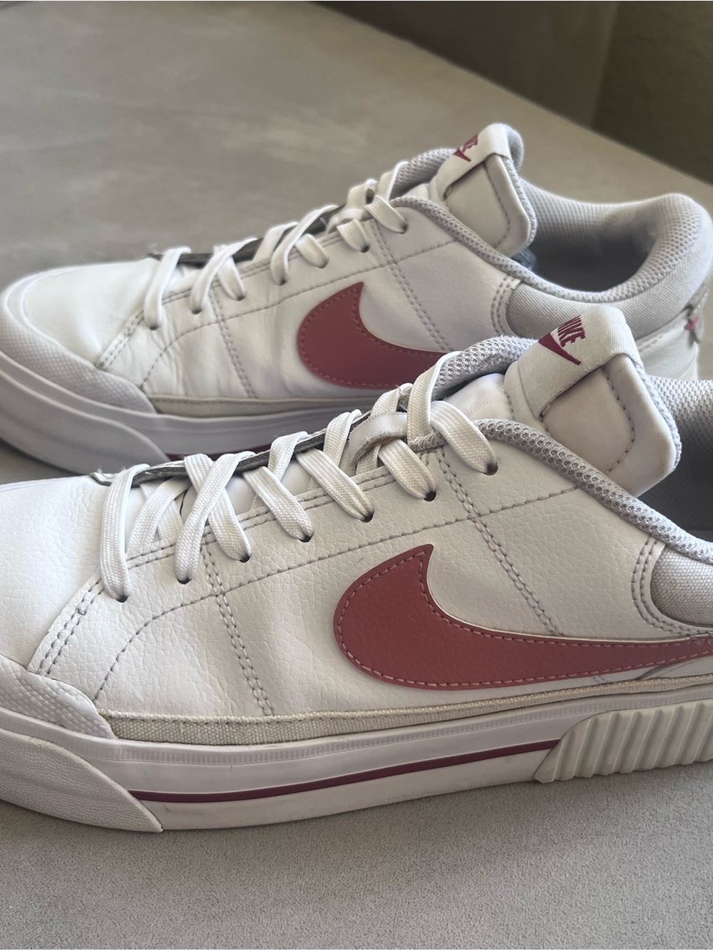 Nike Women’s White Leather Sneakers with Rose Swoosh
